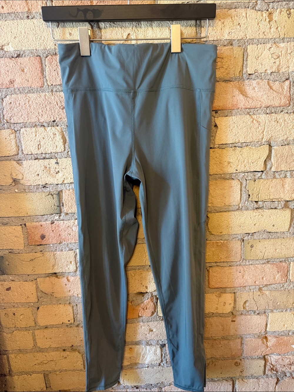Vuori High-Waist Performance Leggings - Slate Blue with zipper pocket on back